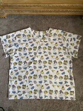 Medical Scrub Top with Yellow, Blue and Pink Vehicle Print size 2X